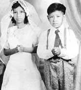 Cesar and older Sister Rita at First Communion.