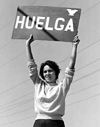 Dolores Huerta holding Huelga (strike) sign during first grape strike.