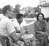 Mentor Fred Ross relaxes with Manuel Chavez and Dolores Huerta at 1962 NWFA founding convention
